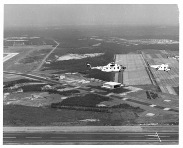 Air Station Cape Cod, Massachusetts
Original photo caption: "District: First Coast Guard District [;] Name of Project: CG AIRSTA, Cape Cod [;] Location: Otis Air Force Base [;] Designer: Praeger Kavanagh Waterbury (Under Default) [;] Contractor: Stamell Construction, Inc. (Under Default) - $2,852,866.00 [;] Volpe Construction Co. (Completion of terminated contract [;] Contract Award Price: $3,257,800.00"; no date/photo number; photographer unknown.

