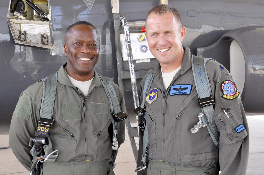 Brig. Gen. Ronald Jolly, 82nd Training Wing commander, and Lt. Col. Matthew Manning prepare to embark on a familiarization flight in a T-38 Talon at Sheppard Air Force Base, June 8, 2017. Familiarization flights improve situational awareness and strengthen the bond between both of Sheppard's training wings. (U.S. Air Force photo by Debi Smith)
