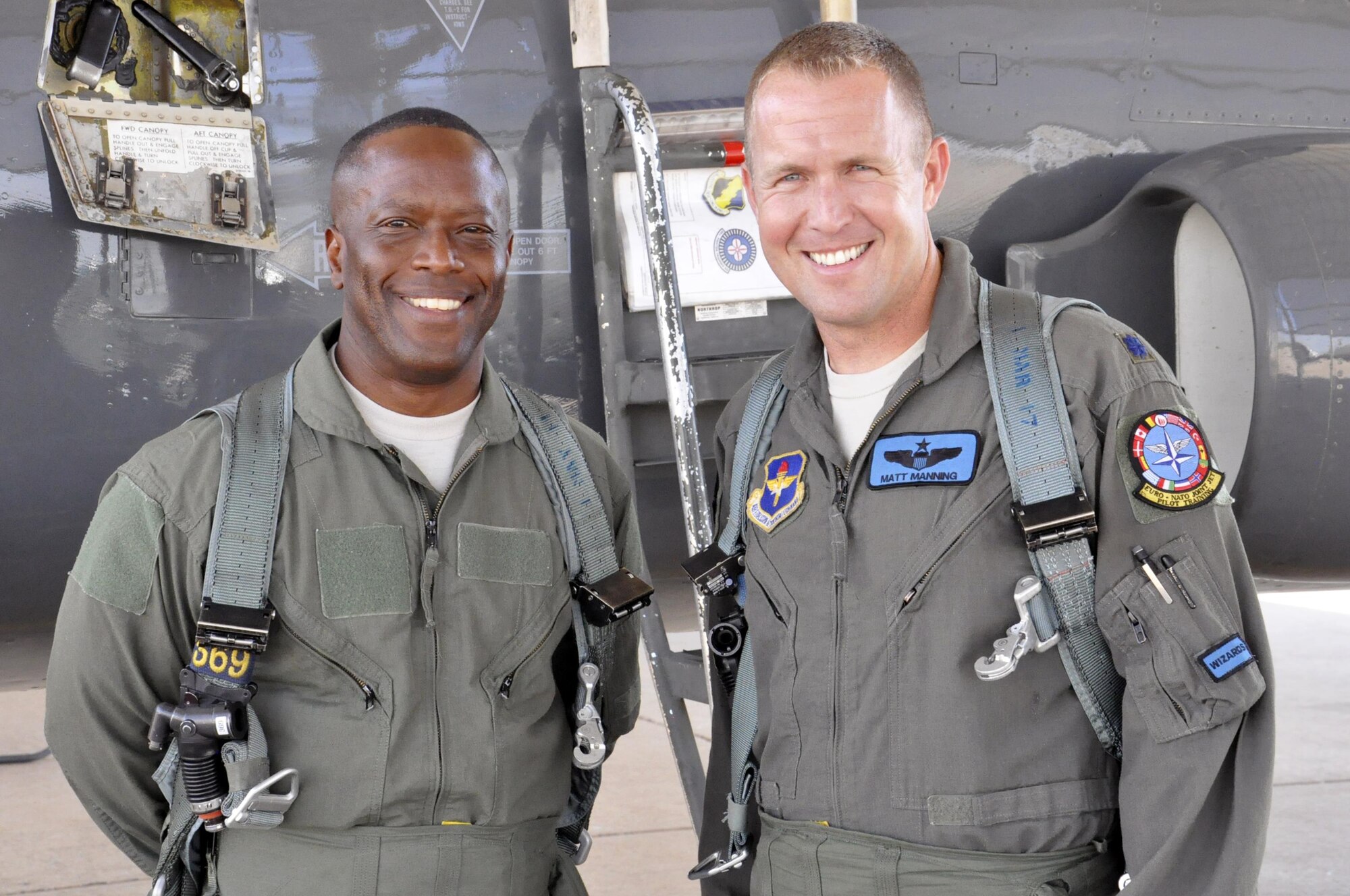 Brig. Gen. Ronald Jolly, 82nd Training Wing commander, and Lt. Col. Matthew Manning prepare to embark on a familiarization flight in a T-38 Talon at Sheppard Air Force Base, June 8, 2017. Familiarization flights improve situational awareness and strengthen the bond between both of Sheppard's training wings. (U.S. Air Force photo by Debi Smith)