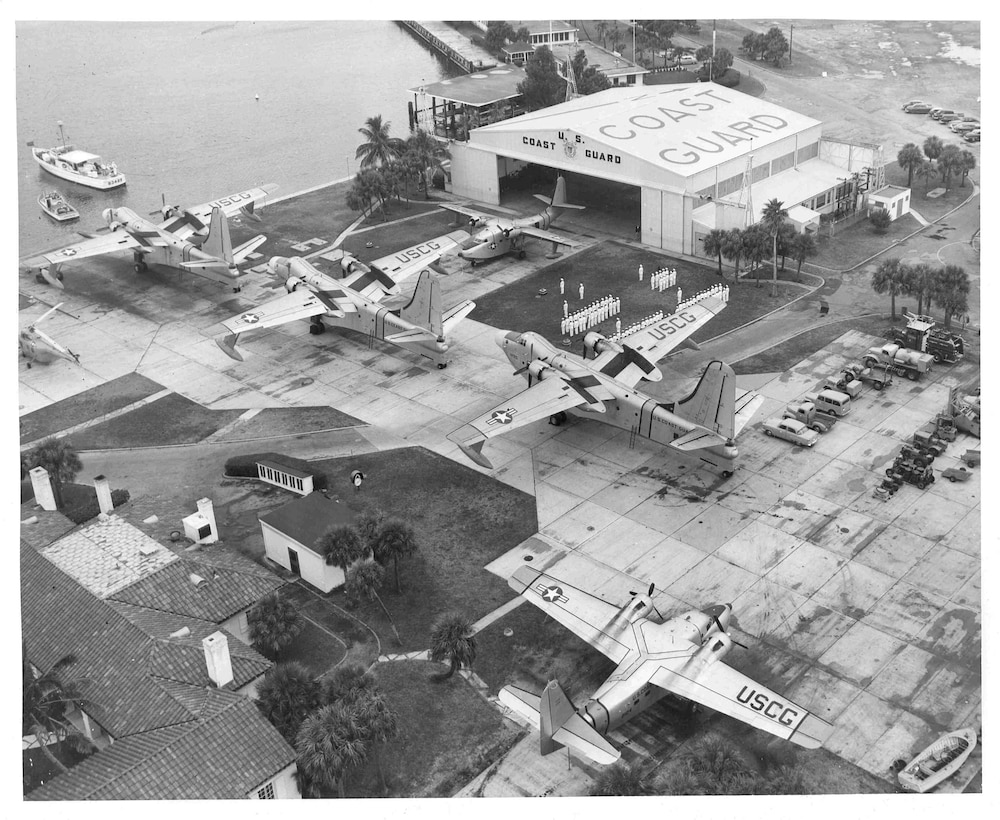 Air Station Clearwater, Florida (Formerly Air Station St. Petersburg)
Original caption reads: "The personnel, planes, and equipment of the U.S. Coast Guard Air Station, St. Petersburg, Fla. are shown at a recent personnel and station inspection. The Coast Guard's search and rescue services from St. Petersburg provide protection to shipping and small craft in offshore and inland waters of the southeastern United States (St. Petersburg Times photograph)"; January, 1955; photo by Johnnie Evans.
