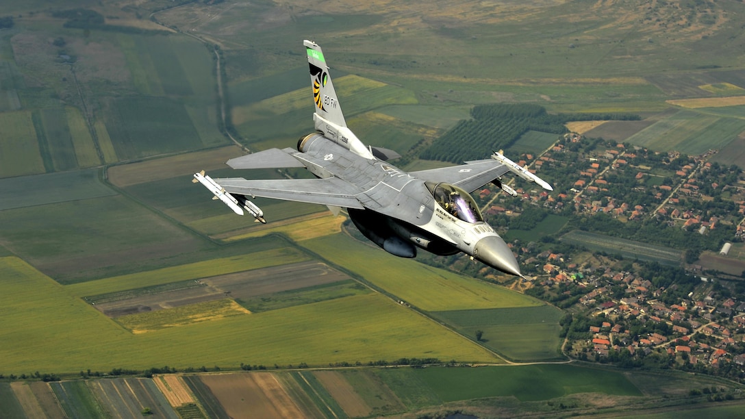 Air Force Lt. Col. Brian Moran flies an F-16 Fighting Falcon over Hungary during exercise Load Diffuser 17, June 6, 2017. More than 400 service members participated in the exercise, a Hungarian Air Force-led multinational flying event between NATO allies and partner nations. Air National Guard photo by Senior Master Sgt. Beth Holliker