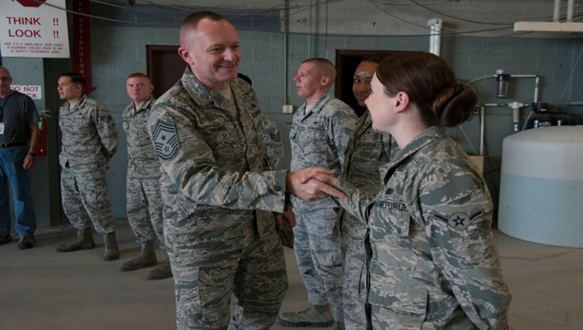 Chief Master Sgt. Jason France, Air Force Materiel Command command chief, meets with Basic Expeditionary Airfield Resources Base Airmen at Holloman Air Force Base, N.M., June 6, 2017. France traveled around BEAR Base receiving briefings from Airmen explaining how civil engineer personnel assigned to BEAR Base are unique and the importance of the various capabilities they possess. (U.S. Air Force photo by Airman 1st Class Ilyana A. Escalona)