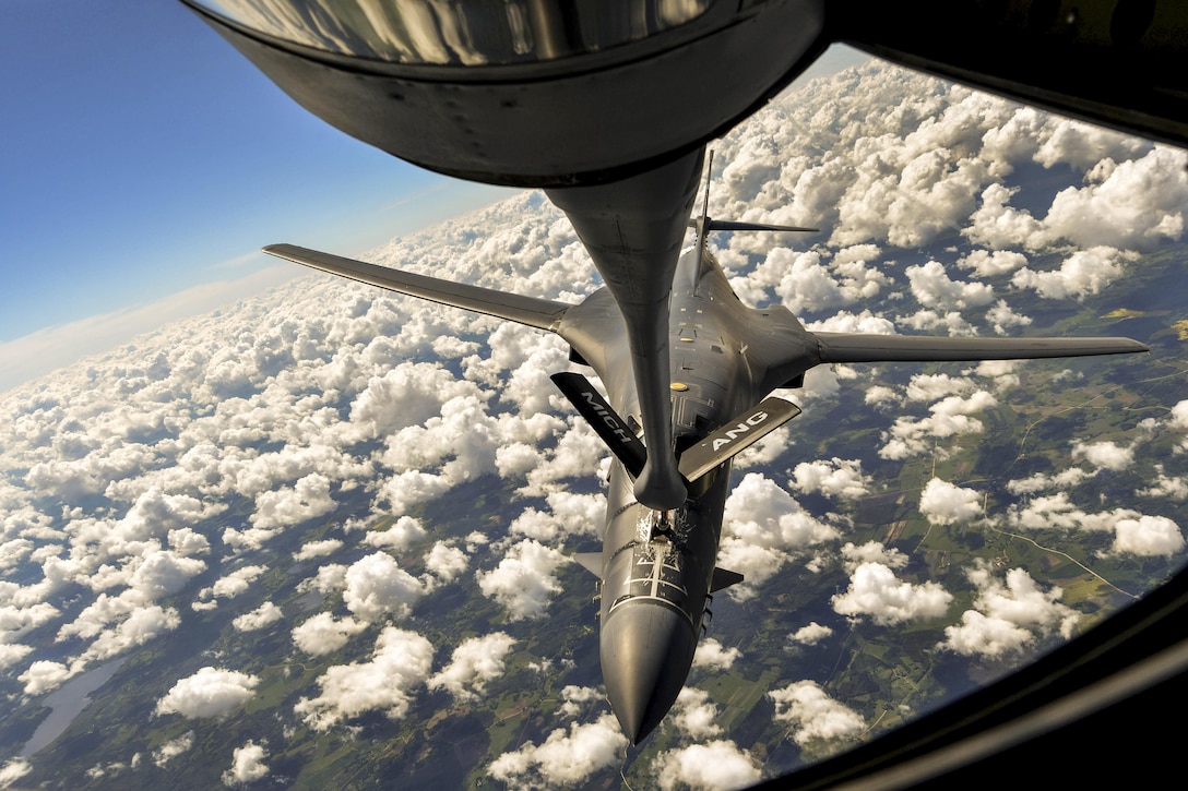 An Air Force B-1B Lancer receives fuel from an Air National Guard KC-135 Stratotanker over Riga, Latvia, during Saber Strike 17, an exercise that aims to promote regional stability and security while strengthening partner capabilities and fostering trust. Air Force photo by Senior Airman Tryphena Mayhugh