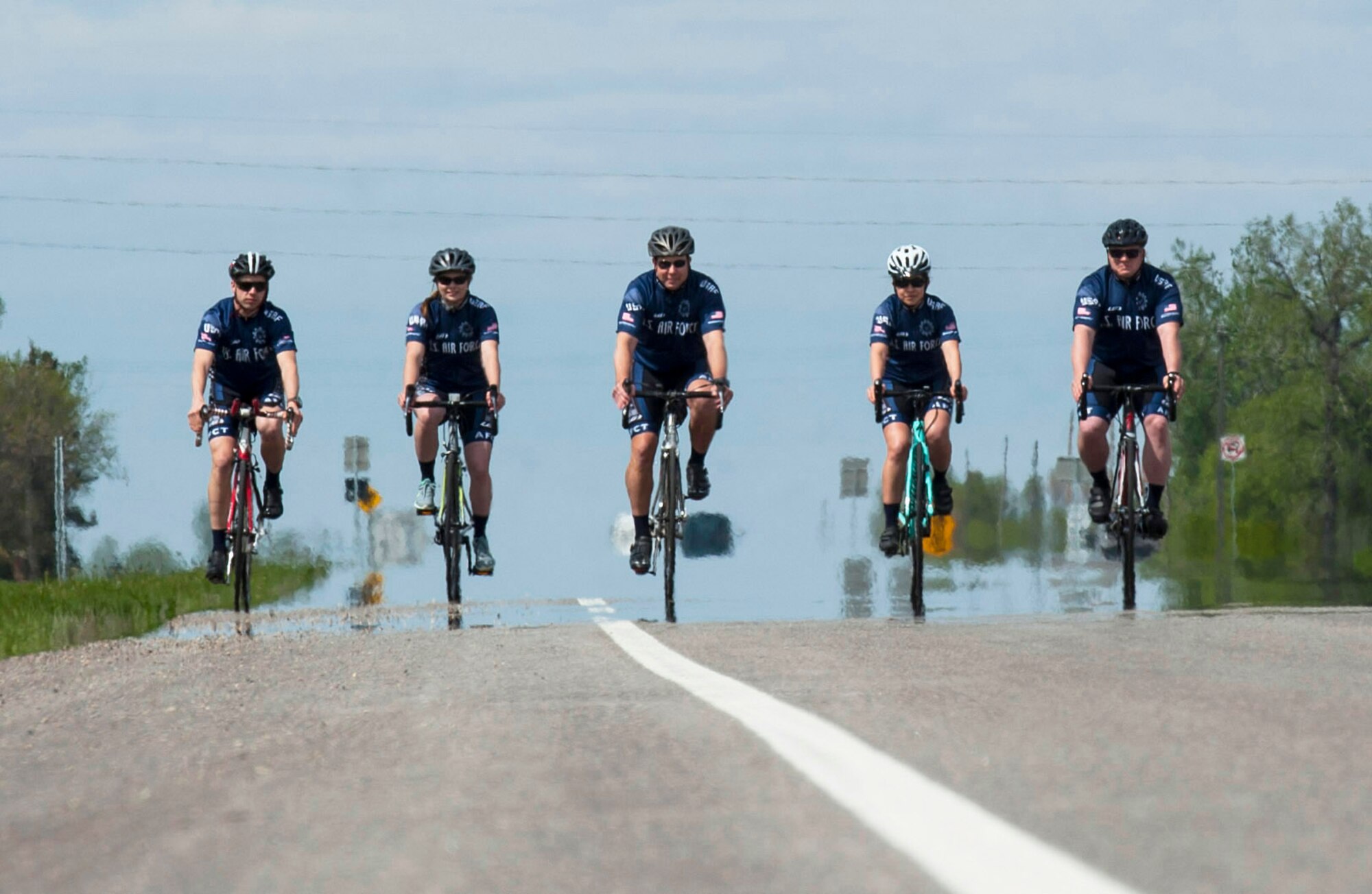 Members of the Air Force Cycling Team ride near Minot Air Force Base, N.D., May 17, 2017. There are six Minot Air Force Base Airmen on the Air Force Cycling Team, which has more than 150 cyclists Air Force-wide. (U.S. Air Force photo/Airman 1st Class Jonathan McElderry)