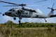 A U.S. Airman from the 9th Expeditionary Bomb Squadron descends from a U.S. Navy MH-60 Seahawk, assigned to Helicopter Sea Combat Squadron Two-Five, during a combat search and rescue training exercise June 5, 2017, at Andersen South, Guam. Service members from Task Force Talon, HSC-25, and the 36th Wing joined together to practice survival, evasion, resistance and escape procedures, emergency evacuation techniques and quick reaction force training. This is the first time these units participated in a combat search and rescue exercise together on Guam.(U.S. Air Force photo by Airman 1st Class Gerald R. Willis)
