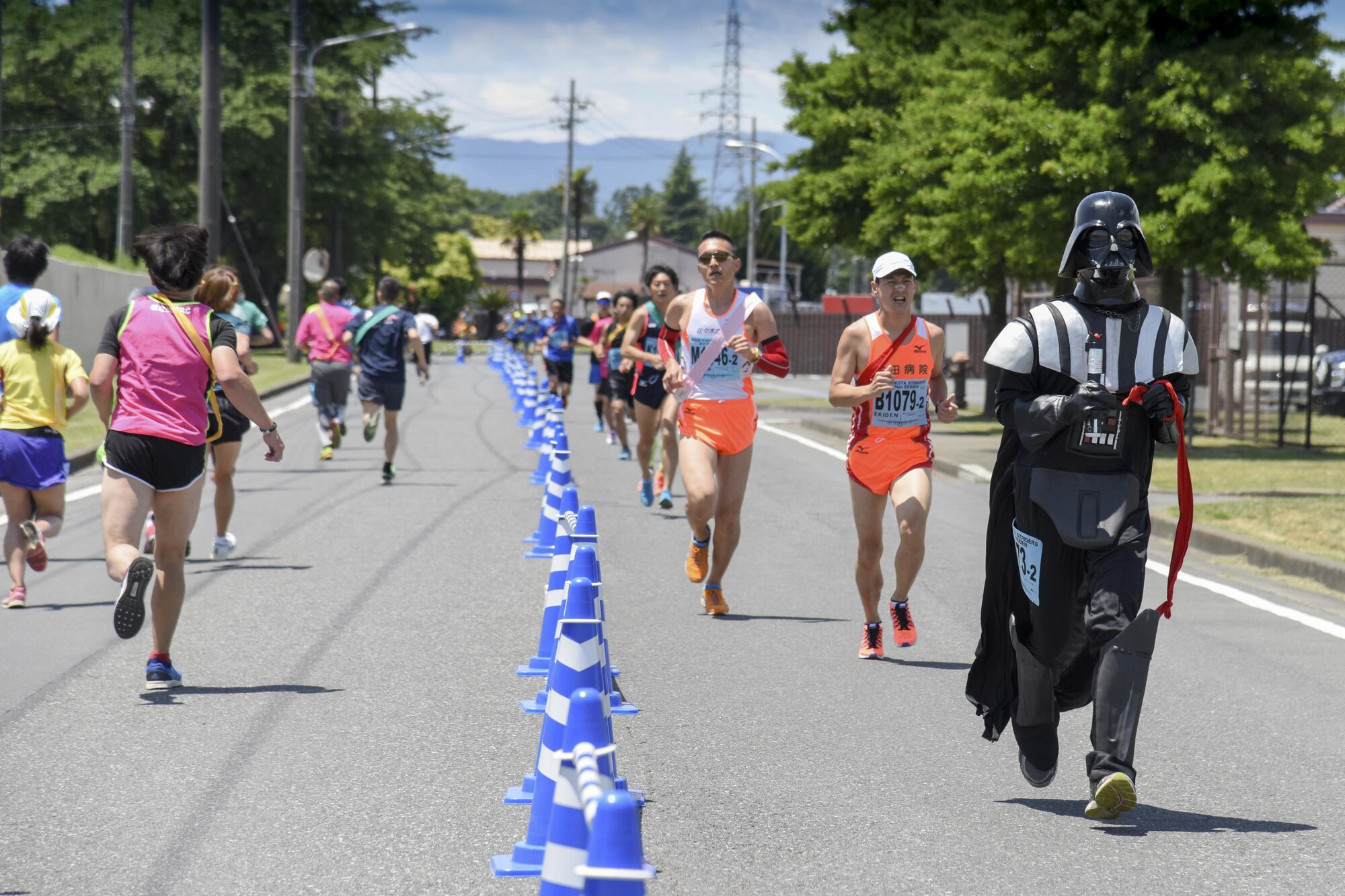 A participant runs in costume during the 33rd Annual Yokota Striders Ekiden at Yokota Air Base, Japan, June 4, 2017. An Ekiden is a Japanese long distance relay that consists of teams of runners covering a certain distance. The Yokota Ekiden is 20K in distance made up of four runners each running a 5K. (U.S. Air Force photo by Machiko Arita)