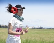 A runner participates in the 5K Race during the 33rd Annual Yokota Striders Ekiden at Yokota Air Base, Japan, June 4, 2017. The races, which consisted of a 2K Kids Run, 2K Family Run, 5K Race and the main Ekiden Race event, promoted friendship and physical fitness. (U.S. Air Force photo by Machiko Arita)
