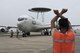 U.S. Air Force Airman Angel Manriquez, 961st Aircraft Maintenance Unit crew chief apprentice, marshals in an E-3 Sentry from the 961st Airborne Air Control Squadron June 8, 2017, at Kadena Air Base, Japan. The 961st AACS is a combat-ready Sentry squadron providing airborne command and control, long-range surveillance, detection and identification information for commanders in support of U.S. goals. (U.S. Air Force photo by Senior Airman John Linzmeier)