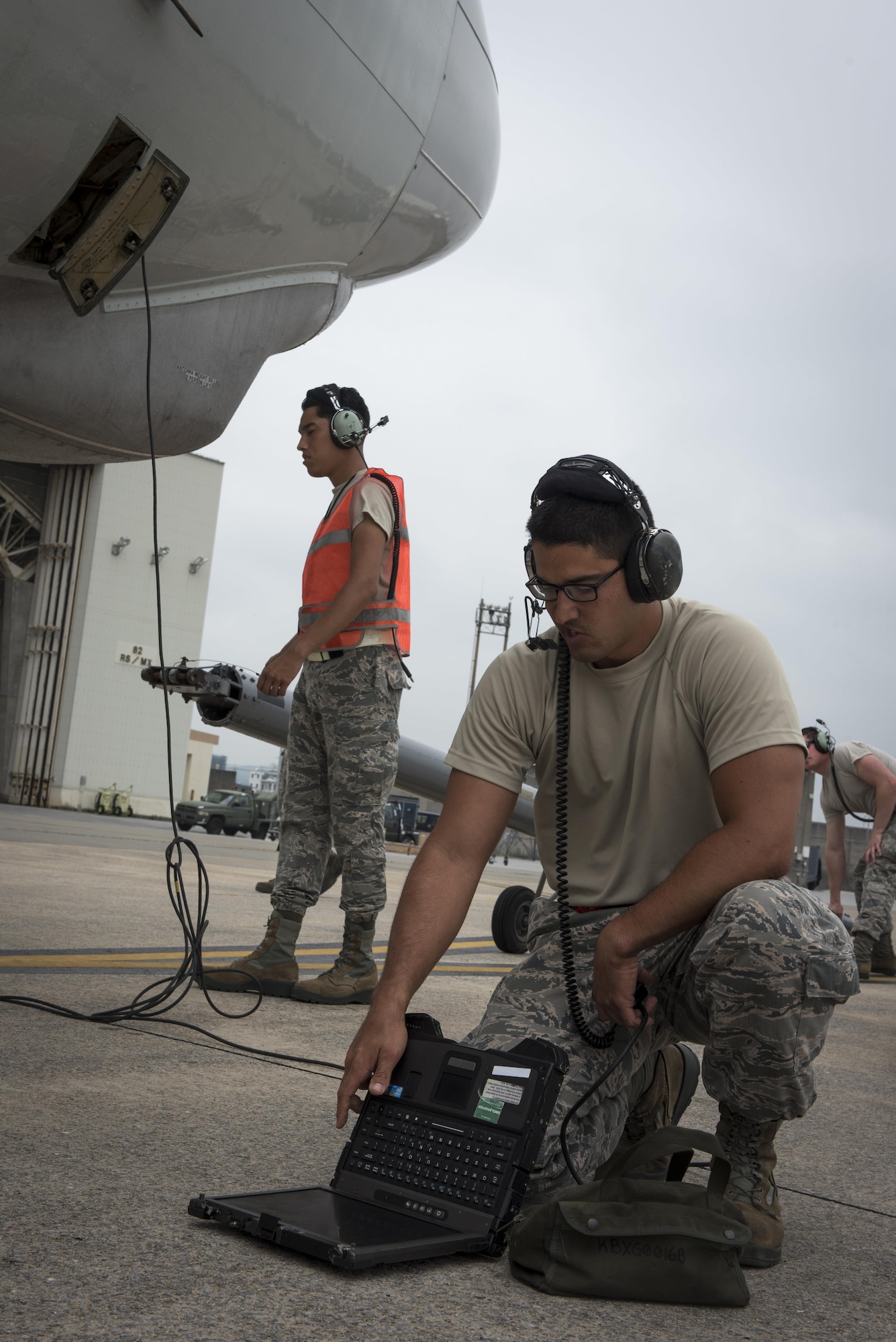 A U.S. Air Force Staff Sg. Michael Velez 961st Aircraft Maintenance Unit instrument and flight control systems craftsman, checks his technical orders as he recovers an E-3 Sentry from the 961st Airborne Air Control Squadron June 8, 2017, at Kadena Air Base, Japan.  The 961st AACS is a combat-ready E-3 Sentry squadron providing airborne command and control, long-range surveillance, detection and identification information for commanders in support of U.S. goals. (U.S. Air Force photo by Senior Airman John Linzmeier)