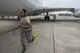 U.S. Air Force Airman 1st Class Erika Jimenez, 961st Aircraft Maintenance Unit aerospace propulsion technician, pulls away an aircraft wheel chock from an E-3 Sentry from the 961st Airborne Air Control Squadron June 8, 2017, at Kadena Air Base, Japan. In support of air-to-ground operations, the Sentry can provide direct information needed for interdiction, reconnaissance, airlift and close-air support for friendly ground forces. (U.S. Air Force photo by Senior Airman John Linzmeier)