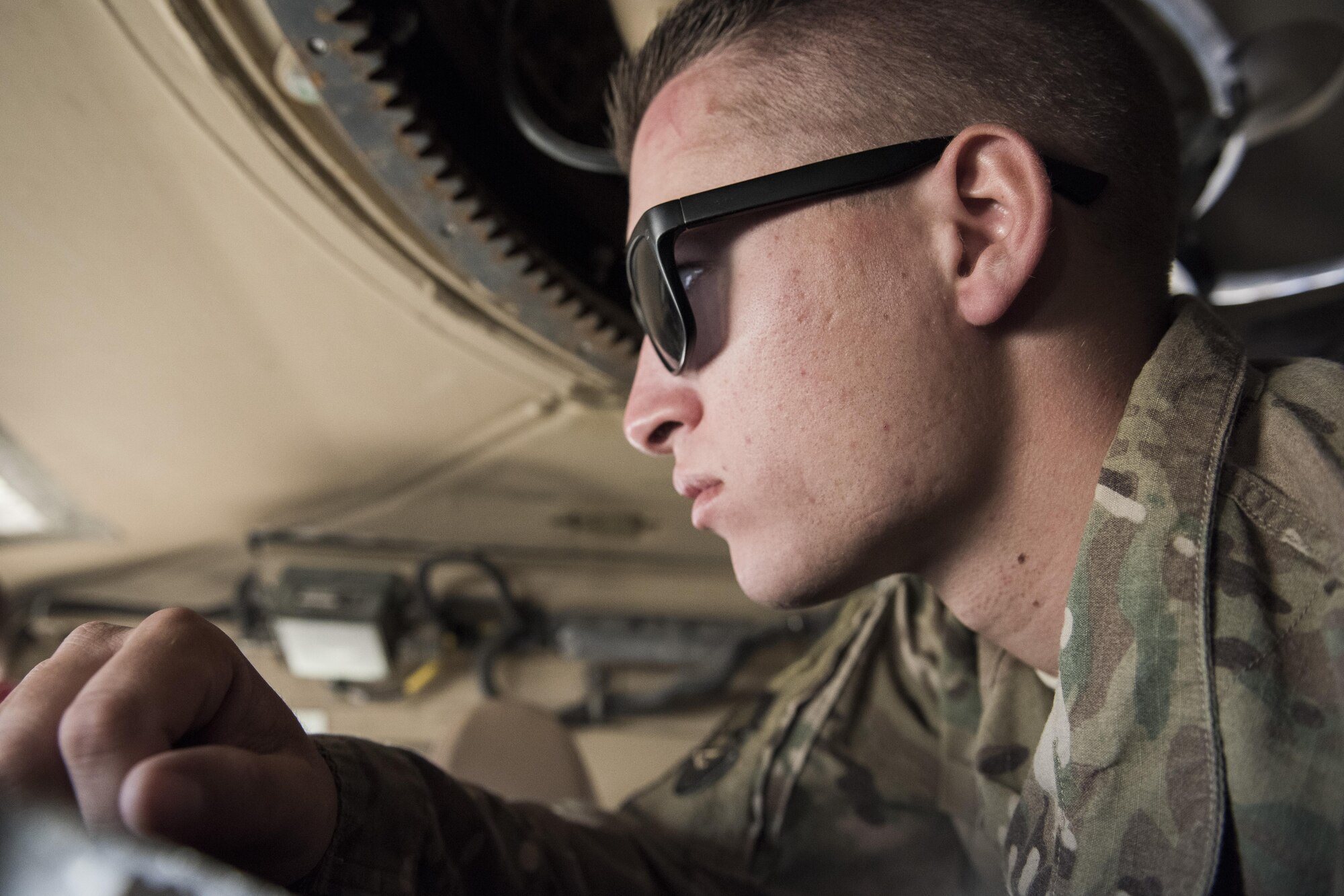 Airman Troy Mailloux, 332nd Expeditionary Security Forces Squadron fire team member, listens as instructions are given for driving a mine-resistant ambush protected all-terrain vehicle May 26, 2017, in Southwest Asia. The M-ATV includes a variety of upgrades from previous vehicles used by security forces. (U.S. Air Force photo/Senior Airman Damon Kasberg