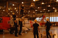Air Station Kodiak, Alaska
Original photo caption: "Crewmen from Coast Guard Air Station Kodiak remove the main rotor head from an HH-60 Jayhawk helicopter during maintenance Monday.  The main rotor head is routinely inspected for wear and tear every 800 flight hours."; photo dated 12 December 2005; Photo No. 051212-C-0368R-001 (FR); photo by PA1 Paul Rozkowski, USCG

