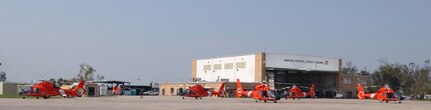 Air Station New Orleans, Louisiana 
Original photo caption: "Coast Guard rescue helicopters line the tarmac at Air Station New Orleans in Belle Chasse, La., today.  Coast Guard search and rescue crews are continuing to respond after Hurricane Katrina left thousands of New Orleans citizens in peril.  The Coast Guard has used aviation assets from Coast Guard Air Stations New Orleans, Houston, Corpus Christi, Texas, Mobile, Ala., Miami, Elizabeth City, N.C., Clearwater, Fla., and Cape Cod, Mass., as well as Navy, Army, National Guard, Coast Guard Auxiliary, Air Force and commercial aircraft."; photo dated 2 September 2005; photo number 050902-C-3550N-060 (FR); photo by PA2 Kyle Niemi, USCG.