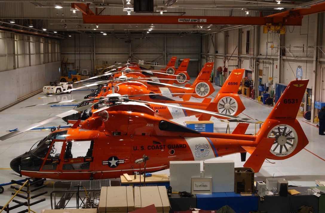 Air Station Traverse City, Michigan
Original photo caption: "All five Coast Guard Air Station Traverse City HH-65 Dolphin helicopters sit ready in the hanger [sic] in Northern Michigan"; photo dated 21 January 2004; photo number 040121-C-8172H-008 (FR); photo by PAC Jeff Hall, USCG.