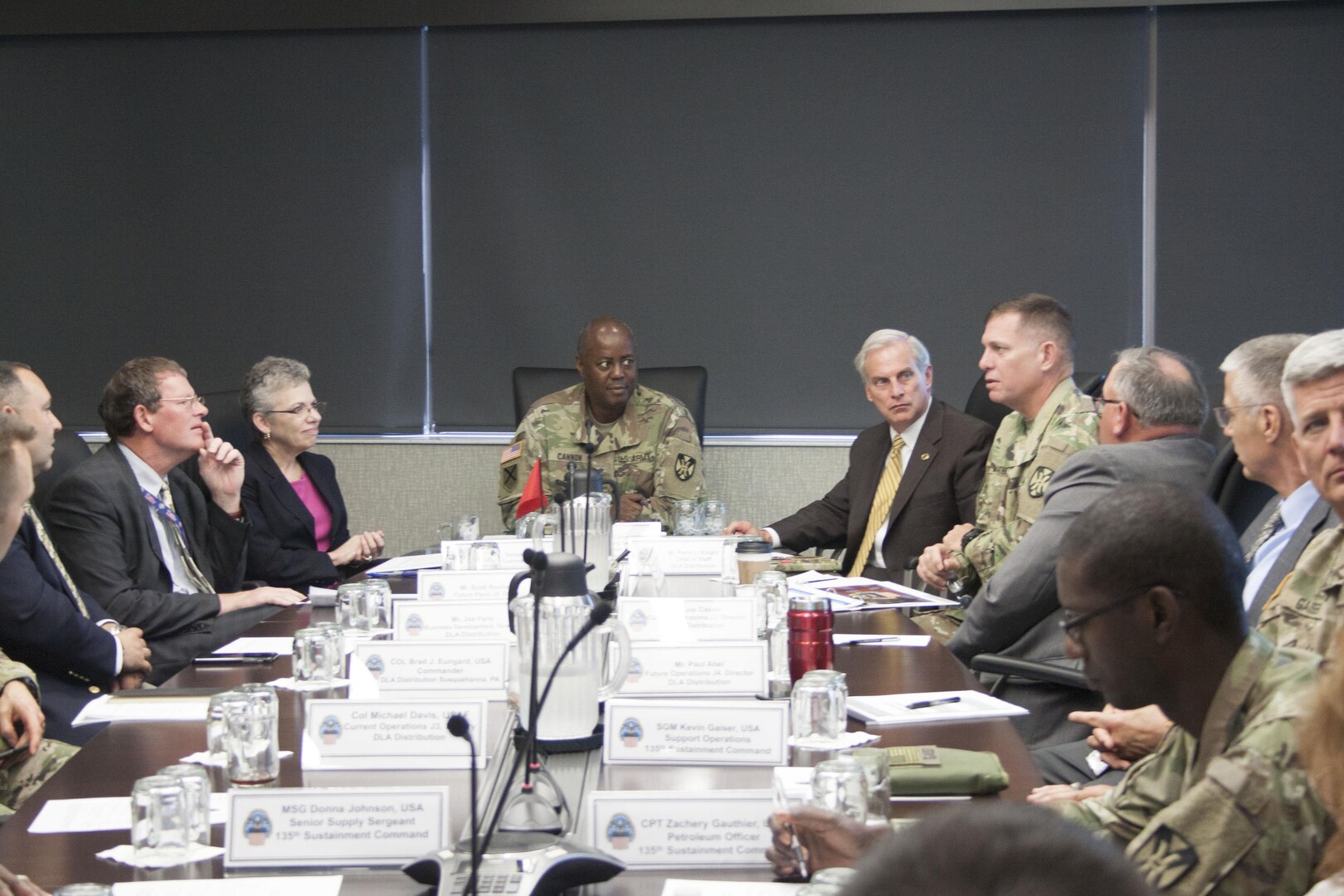Army Brig. Gen. Sylvester Cannon, 135th Sustainment Command (Expeditionary), is briefed on DLA Distribution’s global distribution network and support to Foreign Military Sales.  