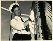 Light Station Boston, Massachusetts
Keeper of Boston Light, Ralph Norwood, BM 2nd Class, US Coast Guard, working on burner of light.  Boston Light, situated on Lighthouse Island in Boston Harbor, celebrating its 58th anniversary, September 14, 1941.
Negative number: NYD 90741005 USCG