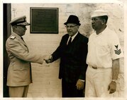 Light Station Boston, Massachusetts
Left to right: Rear Admiral James A. Alger, Jr., Commander, First Coast Guard District, Osborne Earle Hallett, Keeper of Nobska Point Lighthouse, Woods Hole, Mass., and former Keeper of Boston Light, Boatswain's Mate First Class Mike Mikelonis, Officer in Charge of Boston Light.

