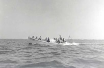 Coast Guard Station Tiana, Hampton Bay, Long Island, New York 1942-1944
"THE MOTOR SURFBOAT ANSWERING A CALL FOR ASSISTANCE." 
Courtesy of Kenneth Sutherland
