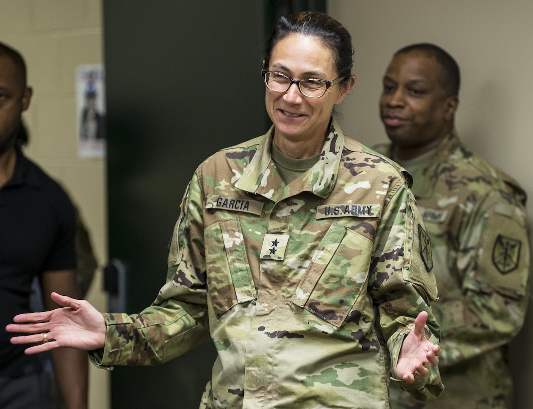 Maj. Gen. Marion Garcia, commanding general of the 200th Military Police Command, thanks her staff for surprising her with a small celebration at Fort Meade, Maryland, to congratulate her on her recent promotion, June 8. (U.S. Army Reserve photo by Master Sgt. Michel Sauret)