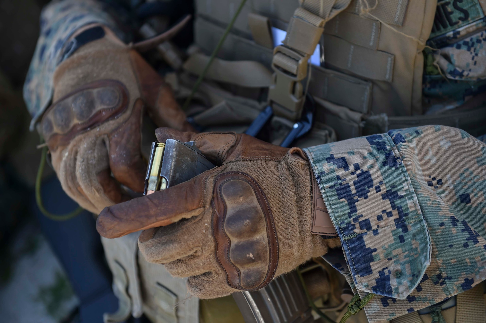 A Marine Special Operations School Individual Training Course student loads a magazine during weapons training, April 10, 2017, at Camp Lejeune, N.C. For the first time, U.S. Air Force Special Tactics Airmen spent three months in Marine Special Operations Command’s Marine Raider training pipeline, representing efforts to build joint mindsets across special operations forces.  (U.S. Air Force photo by Senior Airman Ryan Conroy)