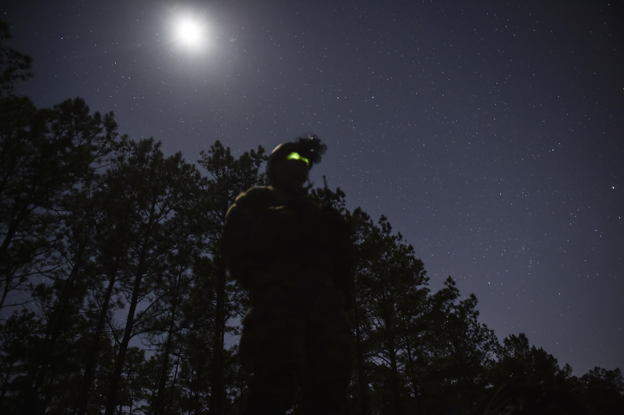 A Marine Special Operations School student maintains security during Field Training Exercise Raider Spirit, May 2, 2017, at Camp Lejeune, N.C. For the first time, U.S. Air Force Special Tactics Airmen spent three months in Marine Special Operations Command’s Marine Raider training pipeline, representing efforts to build joint mindsets across special operations forces.  (U.S. Air Force photo by Senior Airman Ryan Conroy)