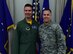 U.S. Air Force Brig. Gen. Paul W. Tibbets IV, left, the 509th Bomb Wing commander, stands with Tech. Sgt. Joshua White, the NCO in charge of force health management, at Whiteman Air Force Base, Mo., May 19, 2017. White submitted “Trinity Tavern” when a survey was sent out proposing various new names for the lounge area in the western wing of Mission’s End. (U.S. Air Force photo by Airman Michaela R. Slanchik)