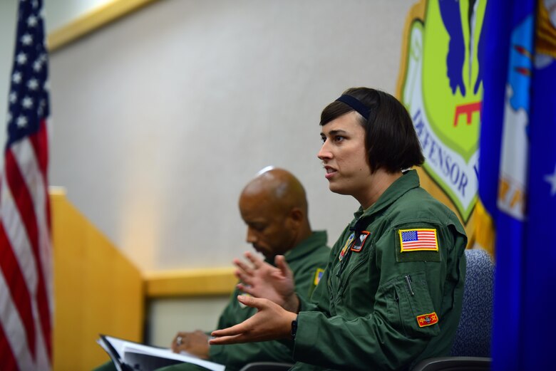 U.S. Air Force Staff Sgt. Ashleigh Buch, the 338th Combat Training Squadron assistant flight chief, and Chief Master Sgt. Stephen Mallette, the 55th Intelligence Support Squadron chief enlisted manager, both assigned to Offutt Air Force Base, Neb., speak during a Lesbian, Gay, Bisexual and Transgender Pride Month forum at Whiteman Air Force Base, Mo., June 6, 2017. During the event, Buch shared her experiences as the first transgender Airman on flying status to complete the transition process under the new policy and the importance of communication to create an open environment. The open forum allowed members of the audience to ask questions about her journey to gain a better understanding of the new policy. It also provided a leadership perspective on how together they navigated the year-and-a-half long process that helped mold the current policy today. (U.S. Air Force photo by Airman 1st Class Jazmin Smith)