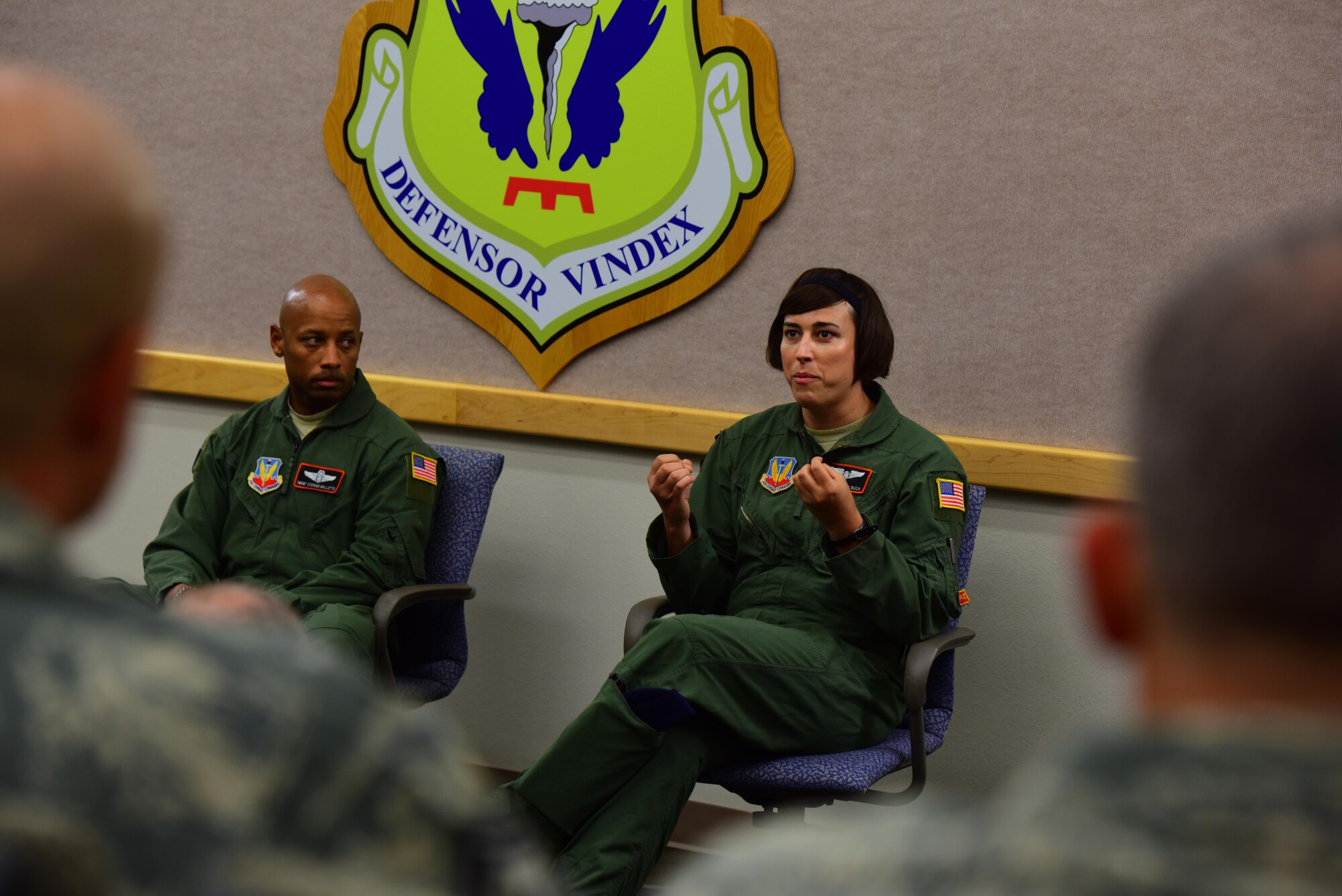 U.S. Air Force Staff Sgt. Ashleigh Buch, the 338th Combat Training Squadron assistant flight chief, and Chief Master Sgt. Stephen Mallette, the 55th Intelligence Support Squadron chief enlisted manager, both assigned to Offutt Air Force Base, Neb., speak during a Lesbian, Gay, Bisexual and Transgender Pride Month forum at Whiteman Air Force Base, Mo., June 6, 2017. During the event, Buch shared her experiences as the first transgender Airman on flying status to complete the transition process under the new policy and the importance of communication to create an open environment. The open forum allowed members of the audience to ask questions about her journey to gain a better understanding of the new policy. It also provided a leadership perspective on how together they navigated the year-and-a-half long process that helped mold the current policy today. (U.S. Air Force photo by Airman 1st Class Jazmin Smith)