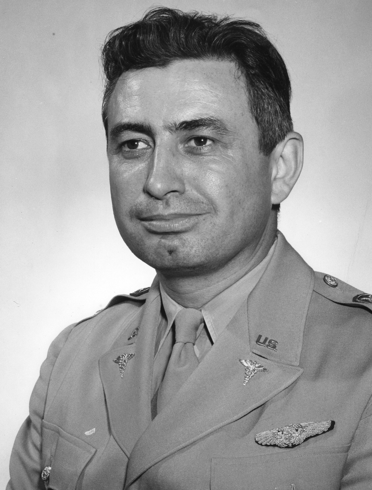 Studio portrait photograph of Lt. Col. William Randolph Lovelace, II, - U.S. Army Air Corps Medical Corps, who completed an extremely high parachute jump. June 29, 1943.