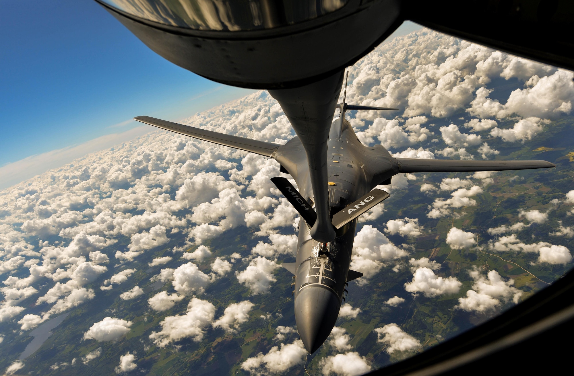 A U.S. Air Force Global Strike Command B-1B Lancer refuels from a U.S. Air National Guard KC-135 Stratotanker during exercise Saber Strike 17 above Riga, Latvia, June 8, 2017. U.S. Air National Guard Senior Airman Jordan Kaminski, 171st Air Refueling Squadron boom operator, off-loaded almost 50,000 pounds of fuel at 6,000 pounds per minute. Saber Strike 17 promotes regional stability and security, while strengthening partner capabilities and fostering trust. (U.S. Air Force photo by Senior Airman Tryphena Mayhugh)