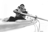 Station Pea Island, North Carolina
USLSS Station #17, Sixth District
 Coast Guard Station #177
Surfman Lonnie C. Gray, USCG   
Surfman Lonnie C. Gray of the Pea Island Station pulls at an oar in the station's surfboat.
No photo number/date; probably 1942.
