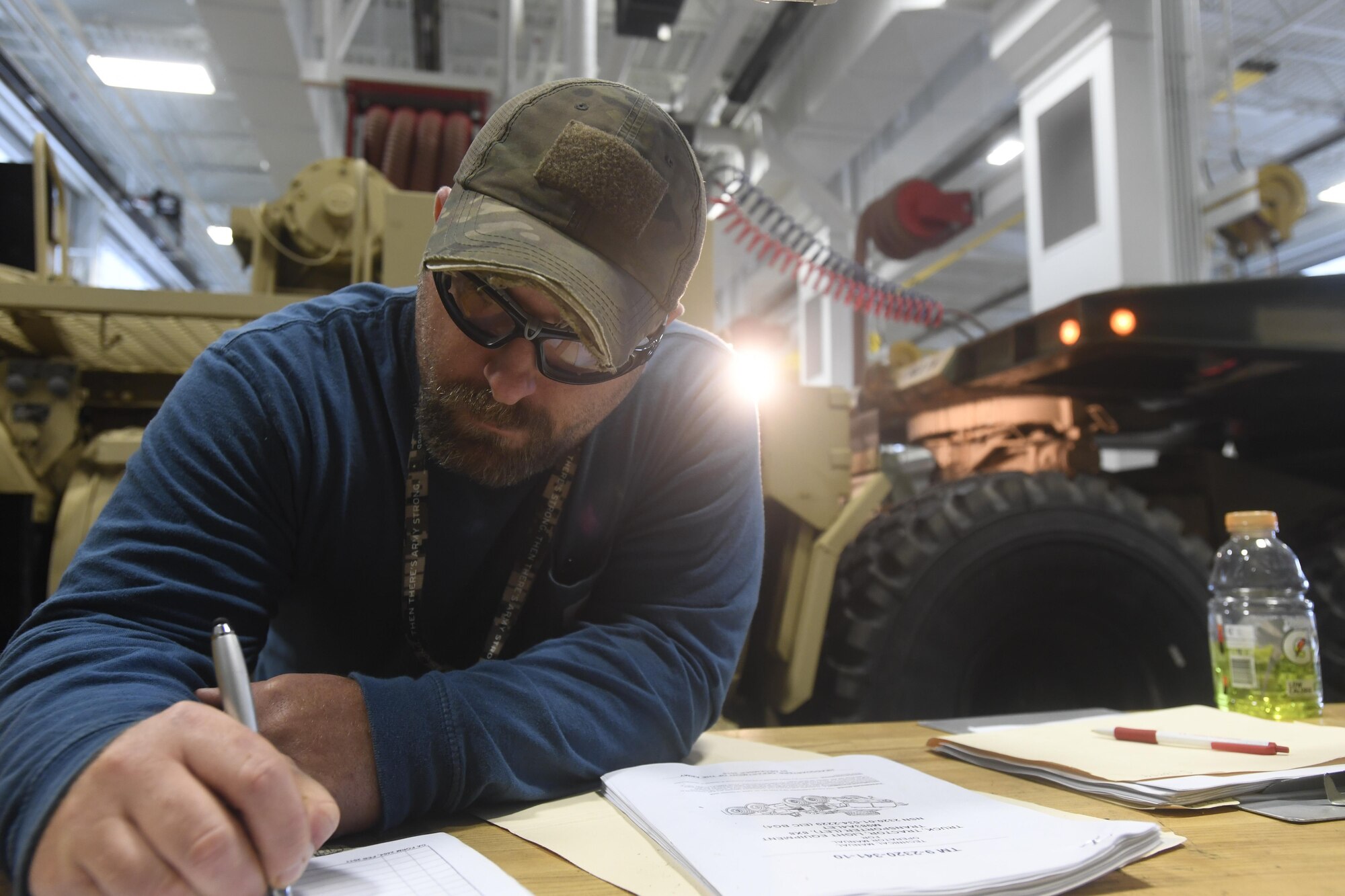 Eric Lambert, an automotive mechanic with the Army Support Activity Logistics Readiness Center, conducts an inspection of a vehicle in an engineering bay at Joint Base McGuire-Dix-Lakehurst, New Jersey, June 7, 2017. The LRC's mechanics and machinists are qualified to maintain and repair over 60 different vehicles ranging from light equipment to heavy equipment. 