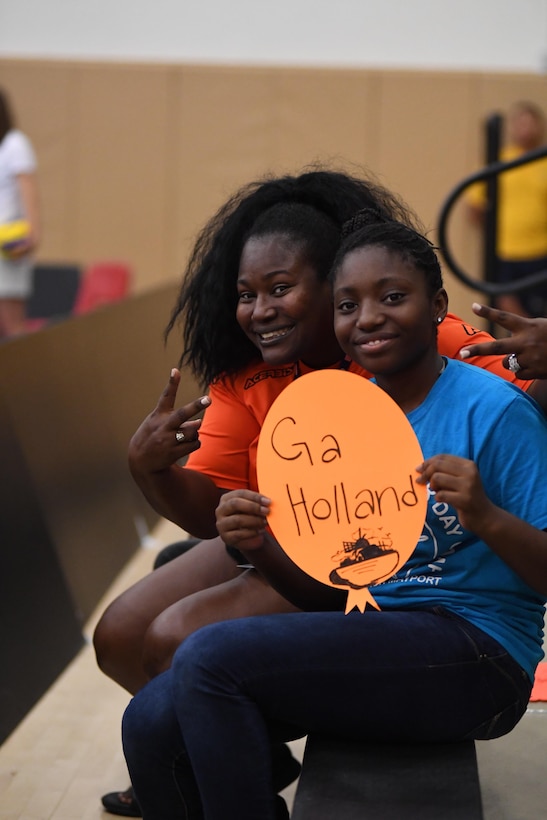 Fans cheering on the Netherlands in Match 5 of the 18th Conseil International du Sport Militaire (CISM) World Women's Military Volleyball Championship on 6 June 2017 at Naval Station Mayport, Florida. (Photo by Petty Officer 2nd Class Timothy Schumaker, NPASE East).