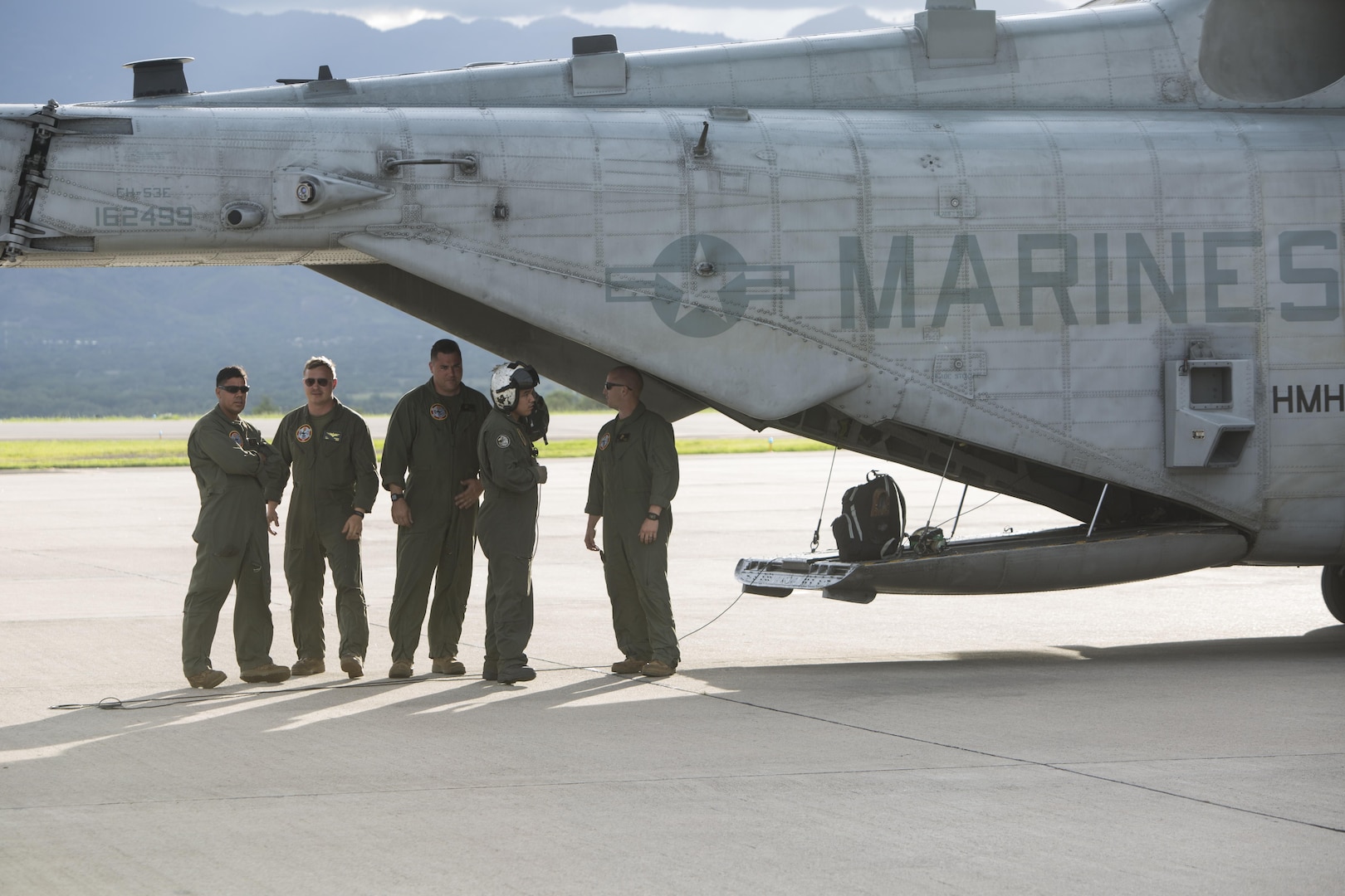 Marines with the Aviation Combat Element, Special Purpose Marine Air-Ground Task Force - Southern Command, leave a CH-53E Super Stallion helicopter June 1, 2017, at Soto Cano Air Base, Honduras. The main body of SPMAGTF-SC arrived in Honduras to begin their six-month deployment in Central America. The task force, comprised of approximately 300 Marines from both active and reserve components, will operate in Belize, El Salvador, Guatemala and Honduras from June to November to conduct engineering projects and build upon security cooperation efforts and established relationships in the region. (U.S. Marine Corps photo by Sgt. Ian Leones)