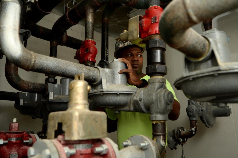 U.S. Army Reserve Soldier Akini Celestine from the 455th Engineer Detachment, inspects pipes at the construction zone he works at in New York City, N.Y., May 22, 2017. After completing his enlistment contract Celestine was looking for employment when he saw the poster for the Veterans in Piping program at the Hawk Education Center at Joint Base Lewis-McCord, WA. A staffer provided him with information and an application. He applied and was accepted. (U.S. Army Photo by Sgt. Jose A. Torres Jr.)