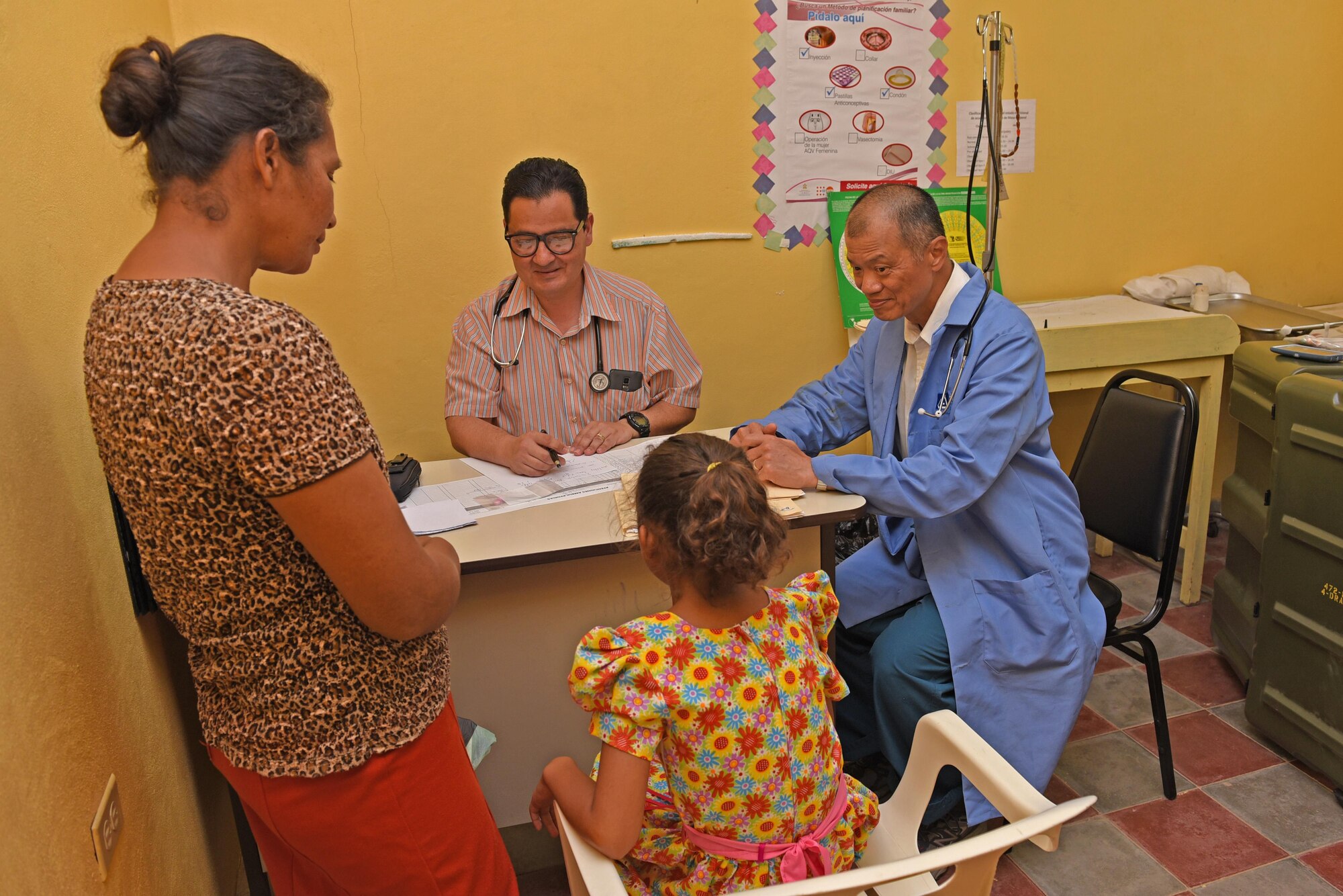 Dr. Carlos Duron (left) and U.S. Army Lt. Col. (Dr.) Jack Leong, Joint Task Force-Bravo Medical Element, see patients at the Regional Health Center in the Tepanguare village located in La Paz, Honduras, May 24, 2017. The doctors participated in a monthly visit to the clinic where they provide free consultations and medications to the local population from Tepanguare and neighboring communities. 