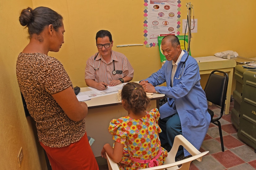 Dr. Carlos Duron (left) and U.S. Army Lt. Col. (Dr.) Jack Leong, Joint Task Force-Bravo Medical Element, see patients at the Regional Health Center in the Tepanguare village located in La Paz, Honduras, May 24, 2017. The doctors participated in a monthly visit to the clinic where they provide free consultations and medications to the local population from Tepanguare and neighboring communities. 