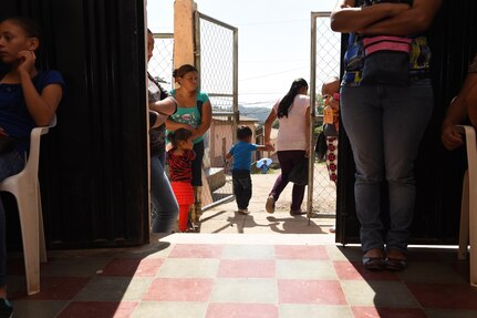 Patients exit the Regional Health Center in the Tepanguare village located in La Paz, Honduras, May 24, 2017 after receiving medical services from Joint Task Force-Bravo’s Medical Element personnel. The MEDEl staff supports the clinic by providing free consultations every four weeks at the understaffed center, caring for patients and providing medications. 