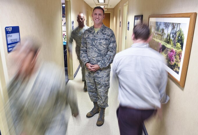 Lt. Col. Brian Neese, 628th Medical Operations Squadron commander, stands in a medical group clinic hallway at Joint Base Charleston, S.C., June 8, 2017. Neese won the Federal Health Care Executive Special Achievement Award which recognizes him and his unit for exceeding Air Force standards and is awarded to a federal career health care executive who has distinguished themselves through singularly significant achievements which have contributed substantially to the mission of the federal health care system. 
