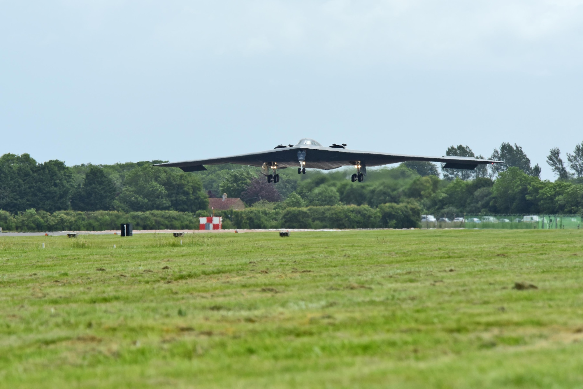 A B-2 Spirt deployed from Whiteman Air Force Base, Mo., approaches the runway at RAF Fairford, U.K., June 9, 2017. The B-2 routinely conducts bomber assurance and deterrence missions providing a flexible and vigilant long-range global strike capability, and is just one demonstration of the U.S. commitment to supporting global security. (U.S. Air Force photo by Tech. Sgt. Miguel Lara III)