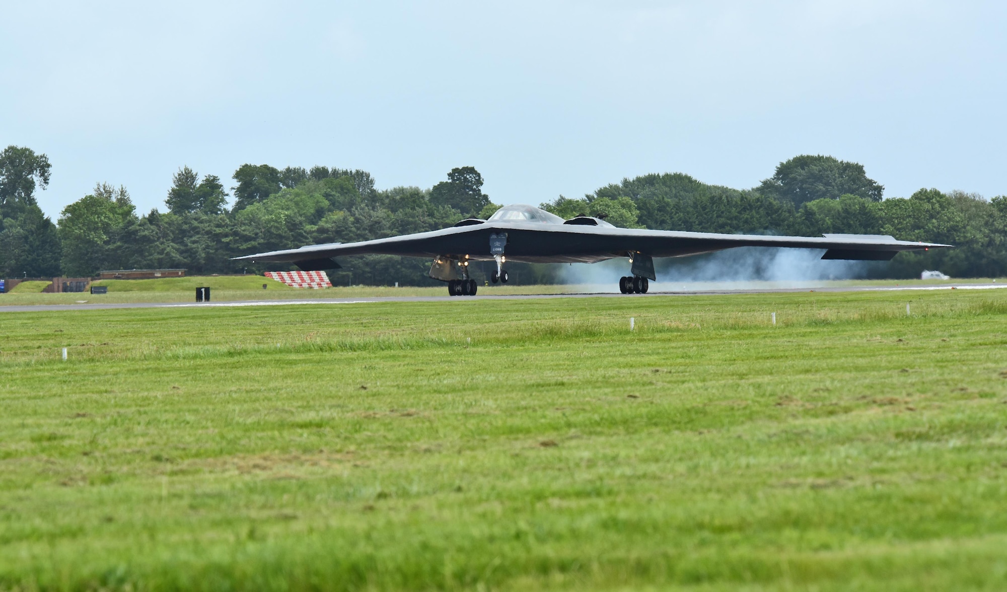 A B-2 Spirit deployed from Whiteman Air Force Base, Mo., lands on the flightline at RAF Fairford, U.K., June 9, 2017. The B-2 regularly conducts strategic bomber missions that demonstrate the credibility of the bomber forces to address a global security environment. (U.S. Air Force photo by Tech. Sgt. Miguel Lara III)