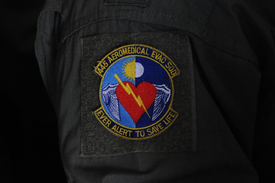 The 445th Aeromedical Evacuation Squadron patch displays on the crew members’ right shoulders during a joint training mission here, June 7, 2017. The 445th AES participates in weekly airborne training to be ever alert to save a life. (U.S. Air Force photo/Senior Airman Joshua Kincaid)