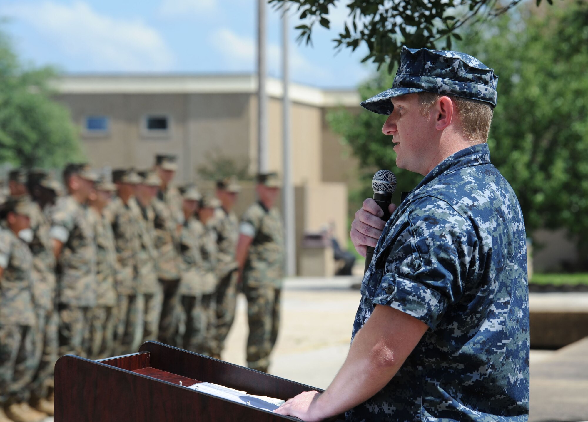 Aerographers Mate 1st Class Tanner Anderson, Center for Naval Aviation Technical Training Unit Keesler instructor, delivers remarks during the Battle of Midway Commemoration Ceremony hosted by CNATTU Keesler June 7, 2017, on Keesler Air Force Base, Miss. The ceremony commemorated the 75th anniversary of the Battle of Midway, which was a U.S. naval victory during World War II. (U.S. Air force photo by Kemberly Groue)