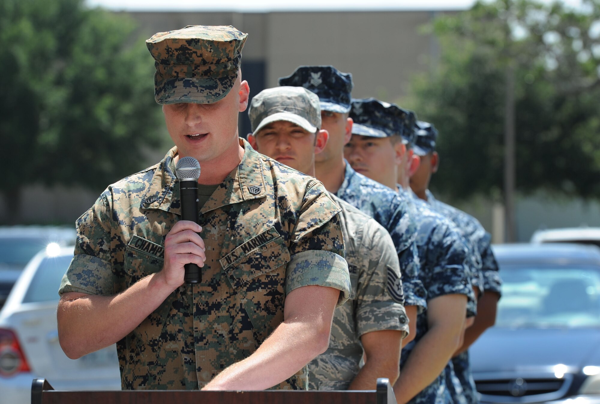 Staff Sgt. Christopher Champagne, Keesler Marine Detachment instructor supervisor, delivers remarks during the Battle of Midway Commemoration Ceremony hosted by CNATTU Keesler June 7, 2017, on Keesler Air Force Base, Miss. The ceremony commemorated the 75th anniversary of the Battle of Midway, which was a U.S. naval victory during World War II. (U.S. Air force photo by Kemberly Groue)