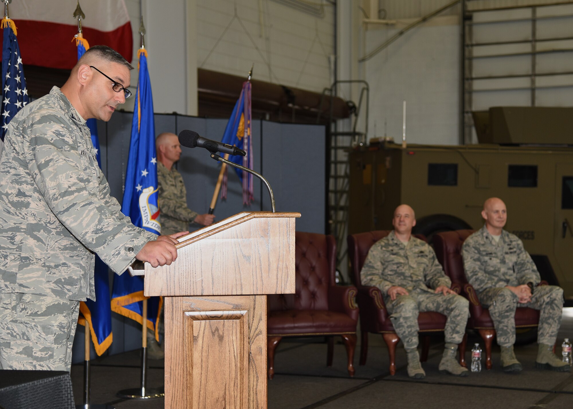 Col. Stephen Kravitsky, 90th Missile Wing commander, speaks at the 90th Security Forces Group Change of Command in the Peacekeeper High Bay on F.E. Warren Air Force Base, Wyo., June 9, 2017. Kravitsky spoke of Col. Christopher Corley's achievements in his tenure at the 90th SFG, as well as why Col. John Grimm is the right man to succeed Corley and assume command of the group. (U.S. Air Force photo by Glenn S. Robertson)