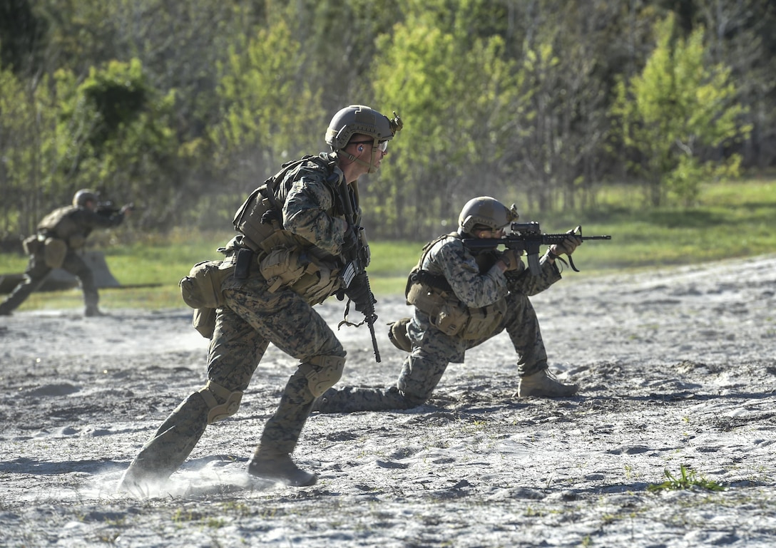 Marine Special Operations School Individual Training Course students run toward targets during live-fire maneuvering training, April 11, 2017, at Camp Lejeune, N.C. For the first time, U.S. Air Force Special Tactics Airmen spent three months in Marine Special Operations Command’s initial Marine Raider training pipeline, representing efforts to build joint mindsets across special operations forces.  (U.S. Air Force photo by Senior Airman Ryan Conroy)