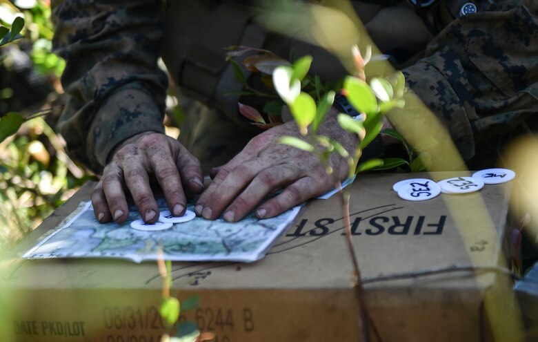 A Marine Special Operations School Individual Training Course student plans an ambush during Field Training Exercise Raider Spirit, May 3, 2017, at Camp Lejeune, N.C. For the first time, U.S. Air Force Special Tactics Airmen spent three months in Marine Special Operations Command’s initial Marine Raider training pipeline, representing efforts to build joint mindsets across special operations forces.  (U.S. Air Force photo by Senior Airman Ryan Conroy)