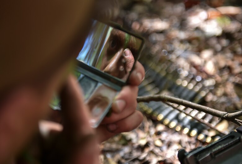 A Marine Special Operations School’s Individual Training Course student applies camouflage paint during Field Training Exercise Raider Spirit, May 3, 2017, at Camp Lejeune, N.C.  For the first time, U.S. Air Force Special Tactics Airmen spent three months in Marine Special Operations Command’s initial Marine Raider training pipeline, representing efforts to build joint mindsets across special operations forces.  (U.S. Air Force photo by Senior Airman Ryan Conroy)