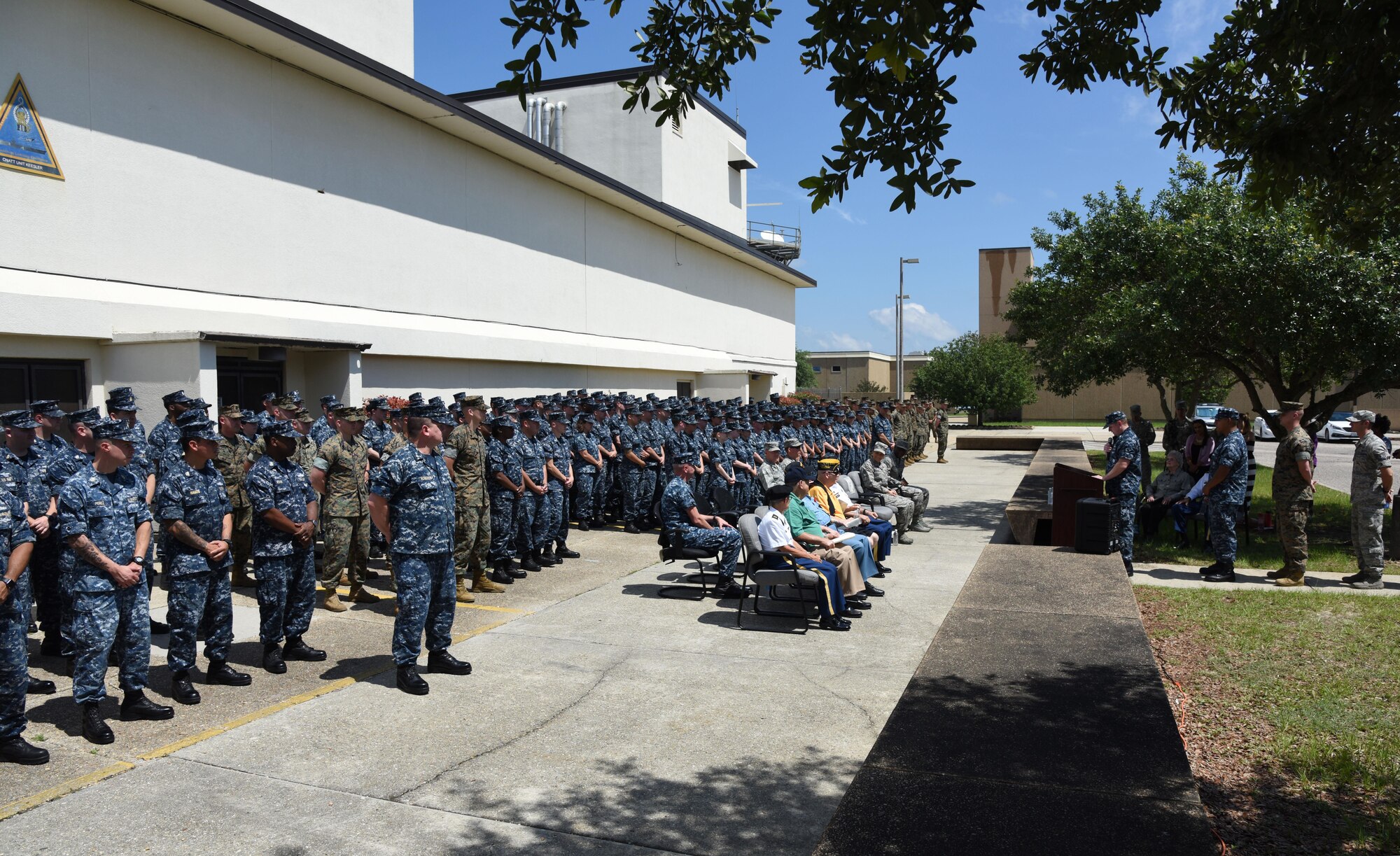Keesler Airmen, Sailors and Marines, and veterans from the Armed Forces Retirement Home in Gulfport, Miss., attend the Battle of Midway Commemoration Ceremony hosted by the Center for Naval Aviation Technical Training Unit Keesler June 7, 2017, on Keesler Air Force Base, Miss. The ceremony commemorated the 75th anniversary of the Battle of Midway, which was a U.S. naval victory during World War II. (U.S. Air force photo by Kemberly Groue)