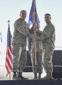 Lt. Col. Robert W. Ryder, (right) 437th Air Maintenance Squadron outgoing commander, passes the guideon to Col. Brian C. Peters, 437th Maintenance Group commander, officially relinquishing his position during a change of command ceremony at Joint Base Charleston June 9, 2017. Ryder had commanded the 437th AMXS since 2015.